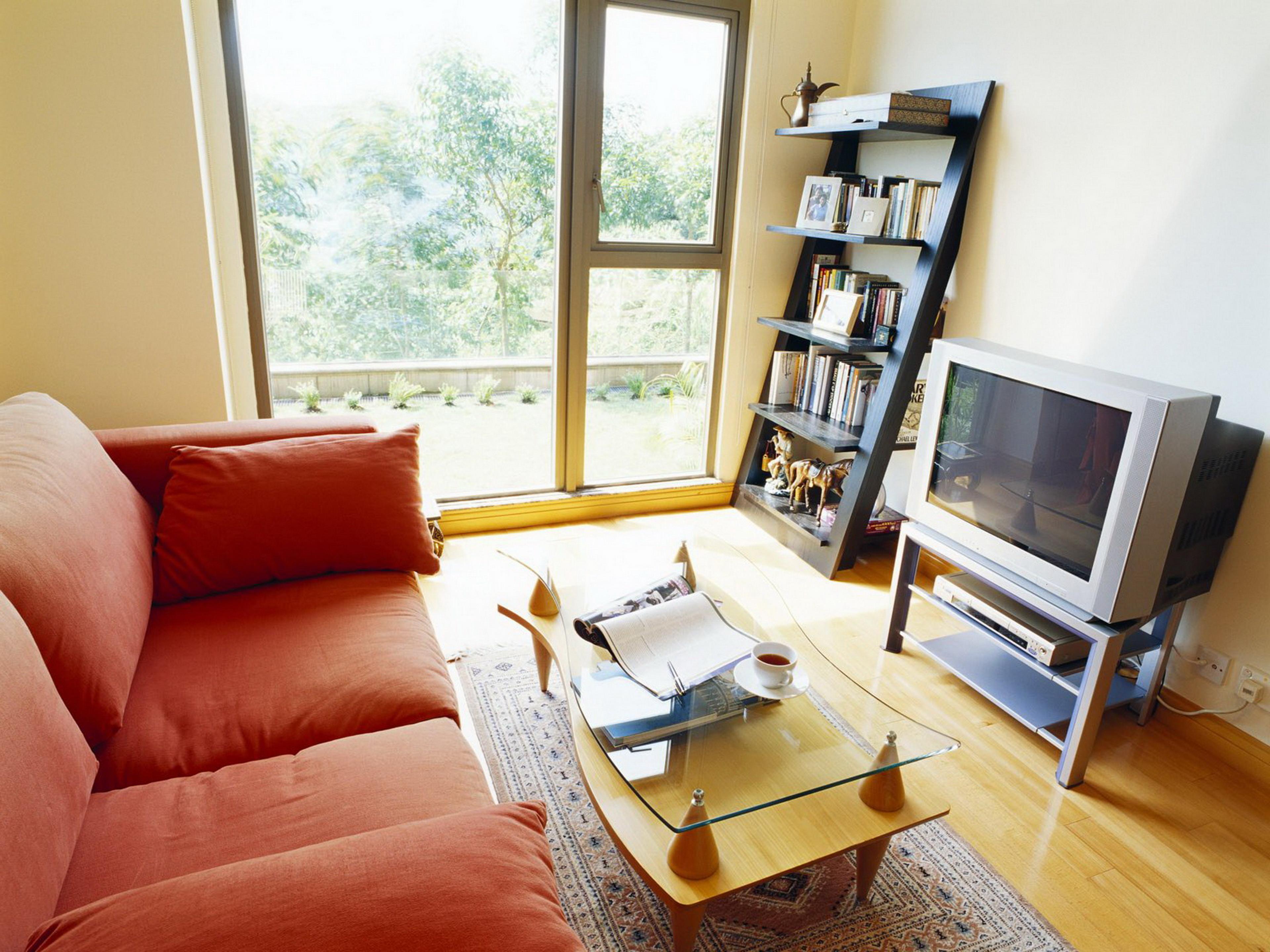 Simple Living Room With TV Unit Center Table And Sliding Door Design 